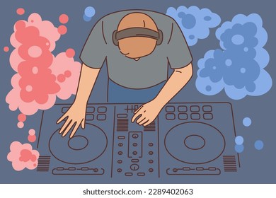 Nightclub DJ uses mixing console to play music from vinyl records to party goers. DJ guy with musical equipment to create energetic tracks during dance festival or disco in entertainment club