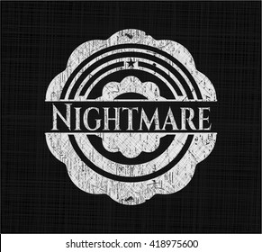 Nightmare chalkboard emblem written on a blackboard