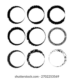 Nine abstract black textured circle shapes on white background