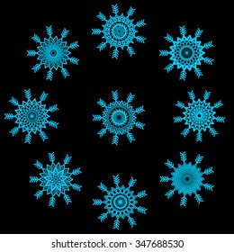 nine snowflakes on a black background