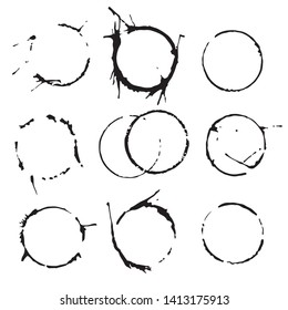 Nine vector coffee cup stains. Black coffee prints set on white background.