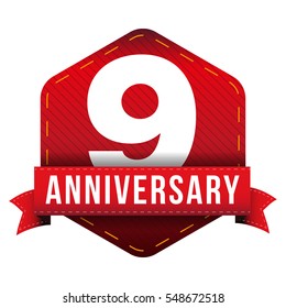 Nine year anniversary badge with red ribbon
