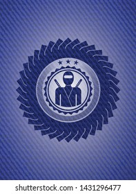 ninja icon inside badge with denim texture