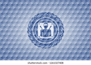 ninja icon inside blue badge with geometric pattern.