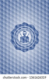 ninja icon inside blue badge with geometric pattern.