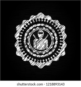 ninja icon inside chalkboard emblem on black board