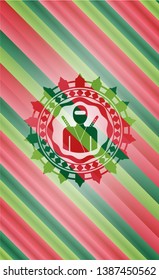 ninja icon inside christmas emblem.