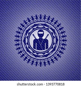 ninja icon inside denim background