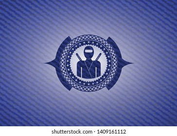 ninja icon inside denim background