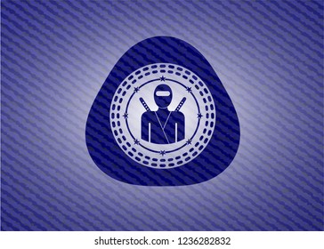 ninja icon inside emblem with denim high quality background