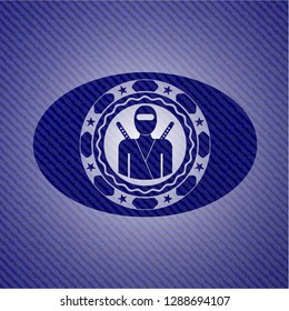 ninja icon inside emblem with denim high quality background
