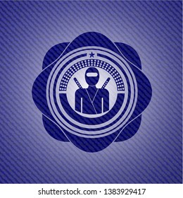ninja icon inside emblem with jean background