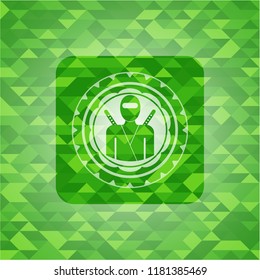 ninja icon inside green emblem with mosaic ecological style background