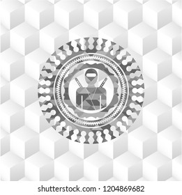 ninja icon inside grey badge with geometric cube white background