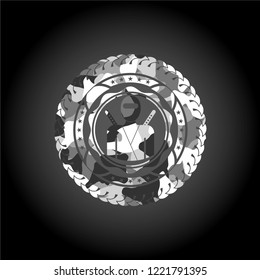 ninja icon inside grey camo emblem