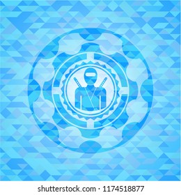 ninja icon inside light blue mosaic emblem
