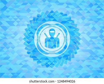 ninja icon inside light blue mosaic emblem