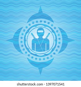 ninja icon inside light blue water wave style emblem.