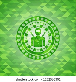 ninja icon inside realistic green mosaic emblem