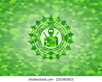 ninja icon inside realistic green emblem. Mosaic background. 