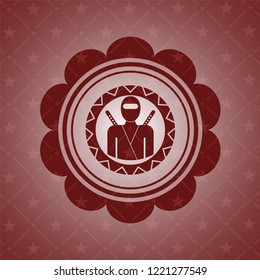 ninja icon inside red emblem