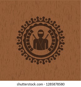 ninja icon inside retro wooden emblem