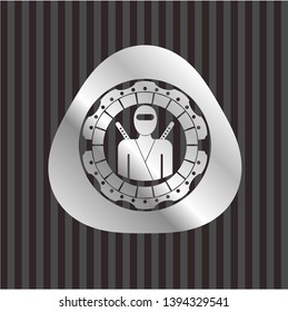 ninja icon inside silver emblem or badge