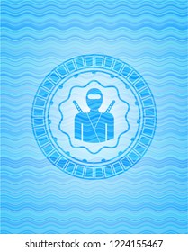 ninja icon inside sky blue water wave style badge.