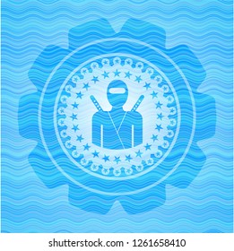 ninja icon inside sky blue water badge.