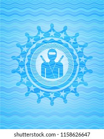 ninja icon inside water emblem background.