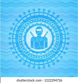 ninja icon inside water representation badge.