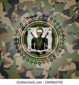 ninja icon on camouflaged pattern