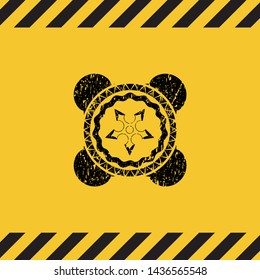ninja star icon black grunge emblem inside yellow warning sign. Vector Illustration. Detailed.