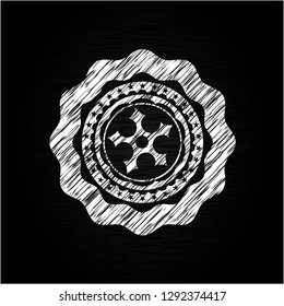 ninja star icon drawn on a chalkboard