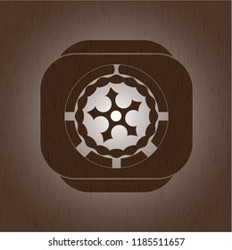 ninja star icon inside badge with wood background
