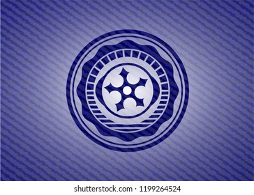 ninja star icon inside badge with jean texture