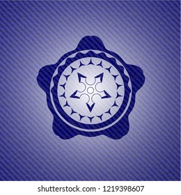 ninja star icon inside badge with denim background