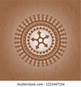 ninja star icon inside badge with wood background