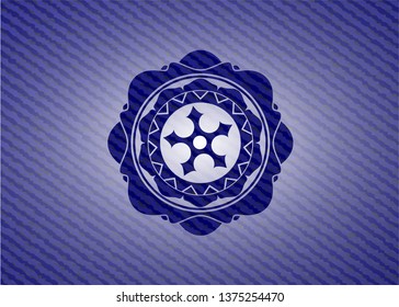 ninja star icon inside badge with jean texture