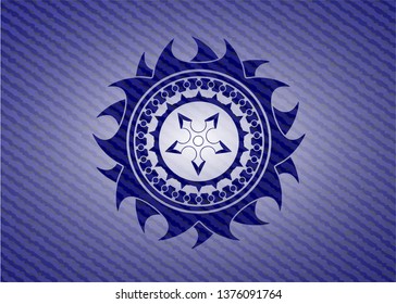 ninja star icon inside badge with denim texture