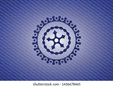 ninja star icon inside badge with jean texture