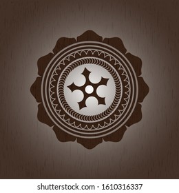 ninja star icon inside badge with wood background