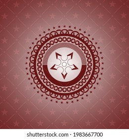 icono de la estrella ninja dentro de la placa con fondo rojo. 