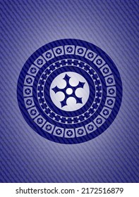 ninja star icon inside badge with denim texture. 