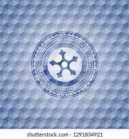 ninja star icon inside blue emblem or badge with abstract geometric pattern background.