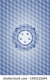 ninja star icon inside blue badge with geometric pattern.