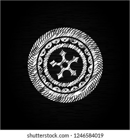 ninja star icon inside chalk emblem written on a blackboard