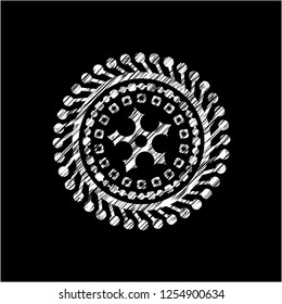 ninja star icon inside chalkboard emblem written on a blackboard