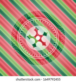 icono de la estrella ninja dentro de la insignia de los colores de Navidad.