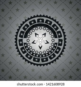 ninja star icon inside dark badge or emblem